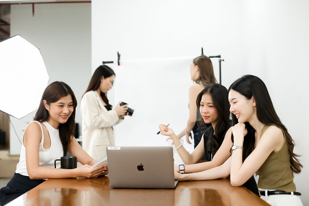 Primal colleagues working together at a laptop
